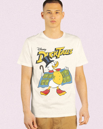 Model wearing a DUCKTALES SCROOGE MCDUCK graphic on light sand coloured BOX TEE