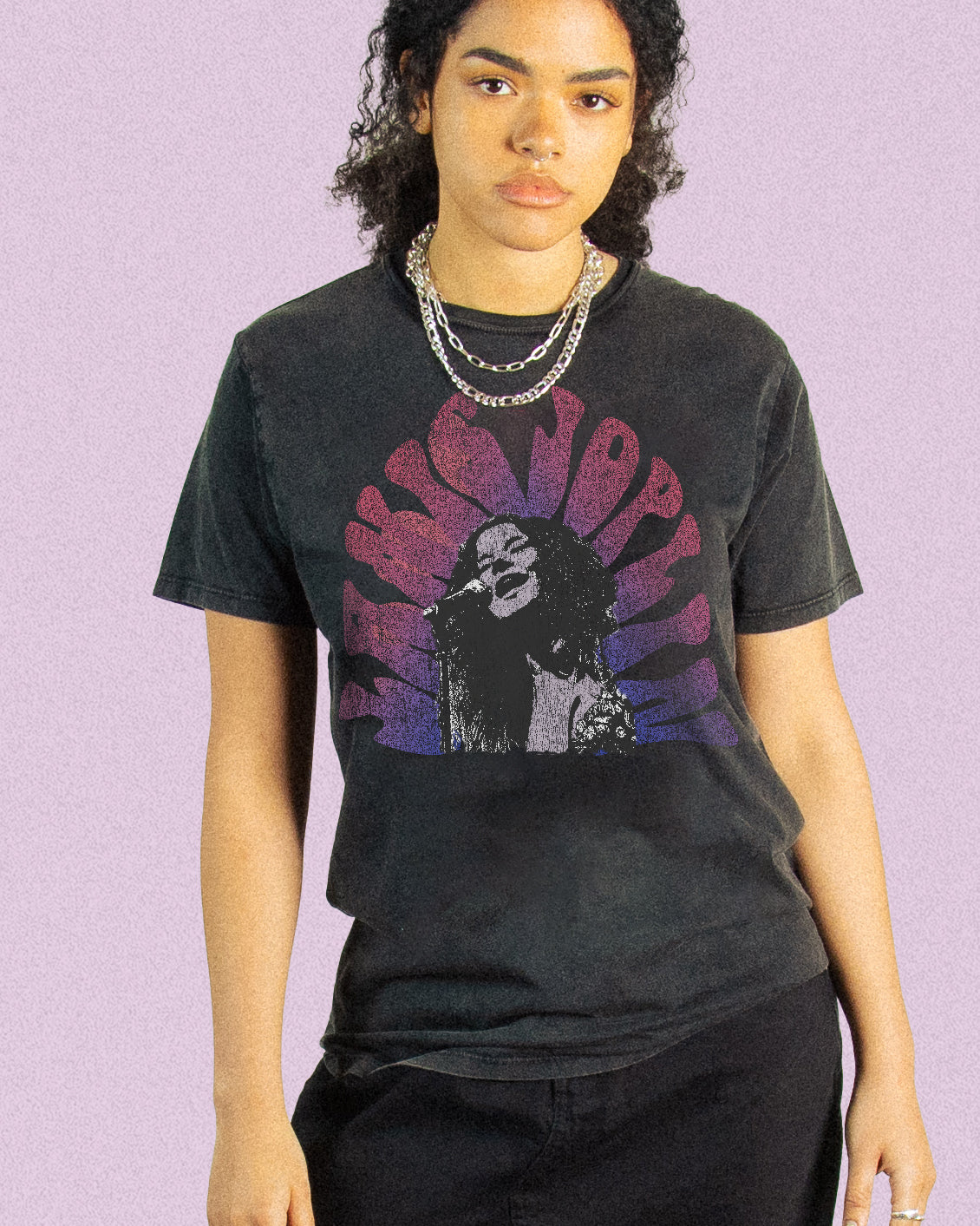 model wearing a vintage Janis Joplin washed black tee 