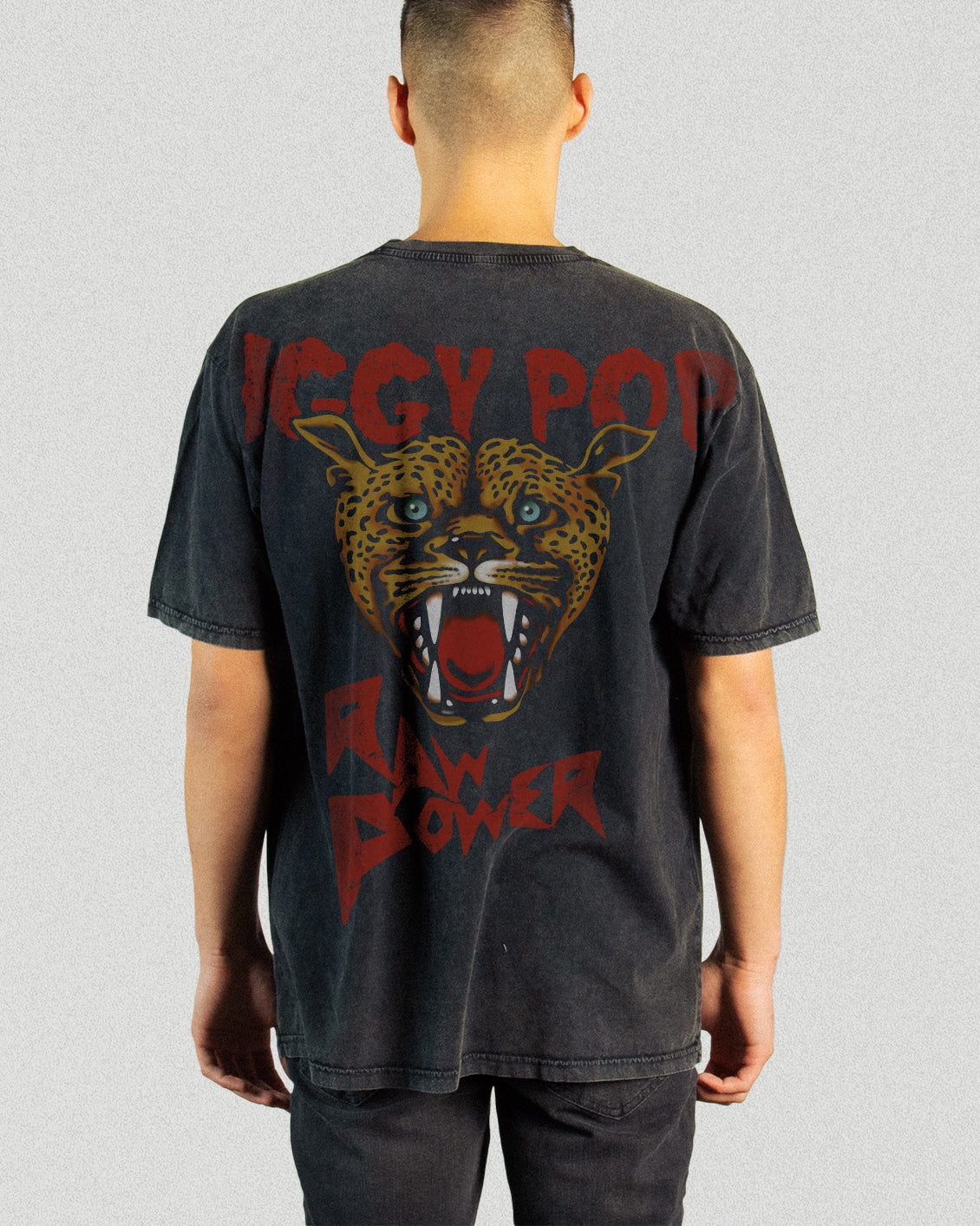 Black washed vintage tee with Iggy Pop Raw Power leopard print graphic